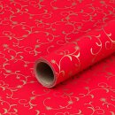 Christmas paper golden arabesques, red gift wrapping...